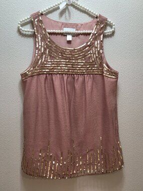Mauve-pink sleeveless tank top featuring an embellished scoop neckline